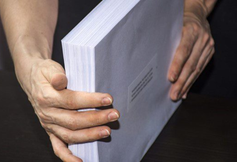 a batch of envelopes enclosed