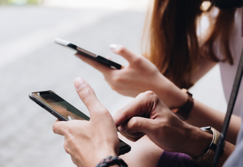 SMS Marketing - image of people using their phones